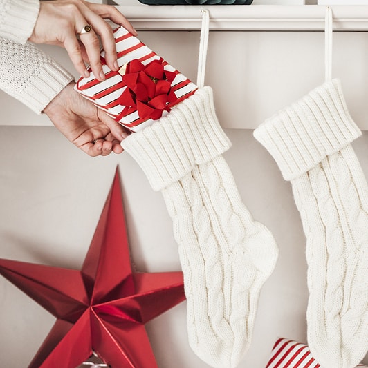julstrumpa stickad vit Partydeco