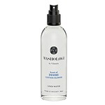 Flaska med linnevatten Desire från WASHOLOGI, 100 ml, med en mjuk doft av bomullsblomma.