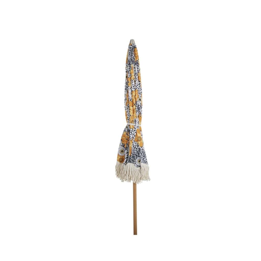 Hopfällt Gatsby parasoll blommig 185 cm från Brafab med franskant och retroblommigt tyg i gult, vitt och svart.