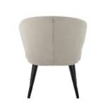 Stol Loon Beige Bloomingville – lounge-stol i beige tyg med svarta metallben, fotograferad bakifrån för att visa den rundade ryggdesignen.