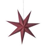Röd julstjärna UNI i papper med dekorativt hålmönster, släckt.